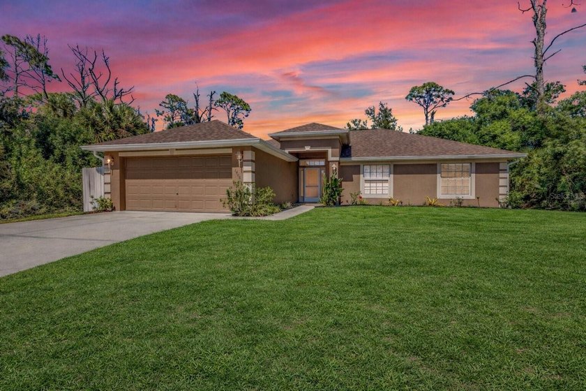 Meticulously maintained 3-bedroom + den, 2-bath home with a - Beach Home for sale in North Port, Florida on Beachhouse.com