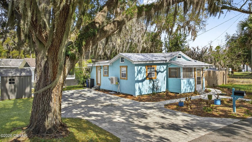 Completely reimagined and beautifully restored, this charming - Beach Home for sale in New Smyrna Beach, Florida on Beachhouse.com