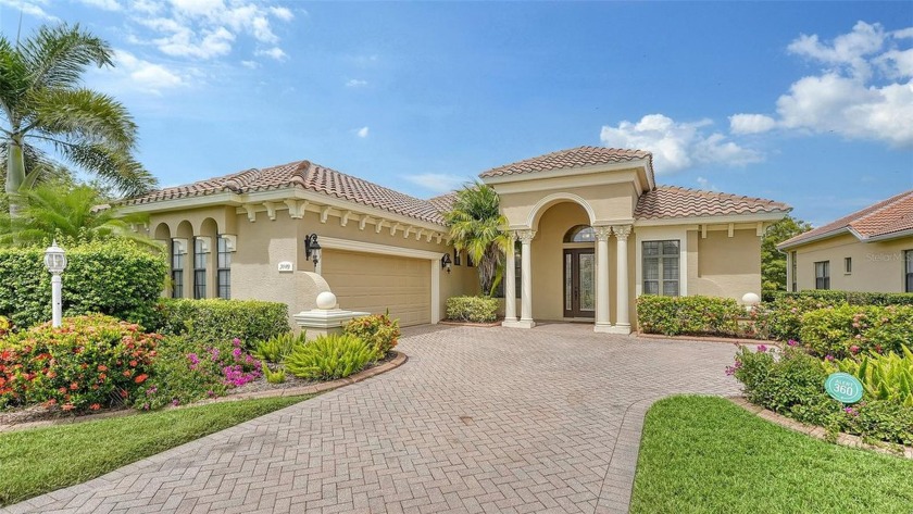 Discover this beautifully designed 3-bedroom, 2-bath home - Beach Home for sale in Lakewood Ranch, Florida on Beachhouse.com