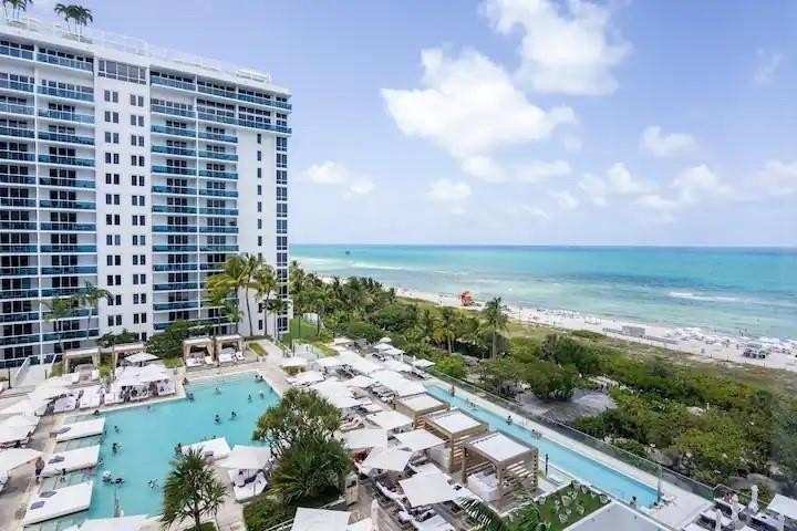 Immerse yourself in the epitome of modern elegance with this - Beach Condo for sale in Miami Beach, Florida on Beachhouse.com