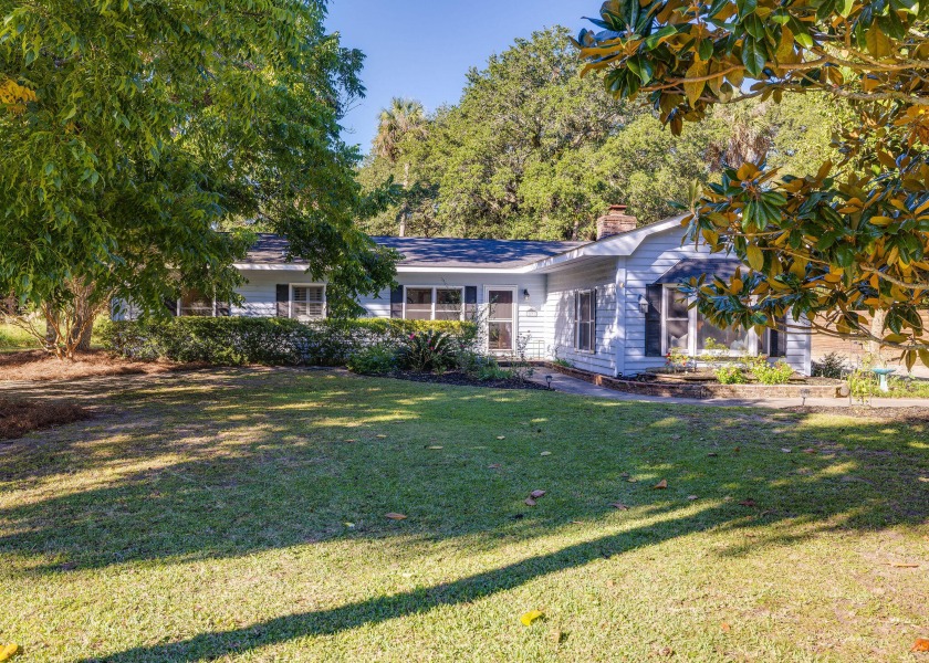 Welcome to this charming rancher nestled on a  rare half-acre - Beach Home for sale in Isle of Palms, South Carolina on Beachhouse.com