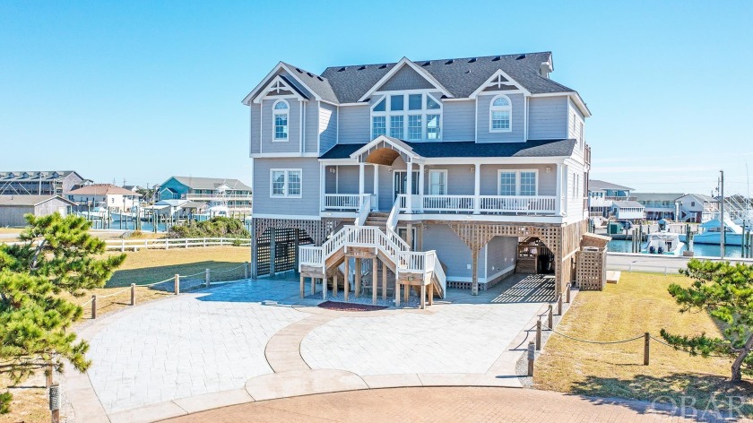 Welcome to your dream coastal retreat in the picturesque Village - Beach Home for sale in Hatteras Island, North Carolina on Beachhouse.com