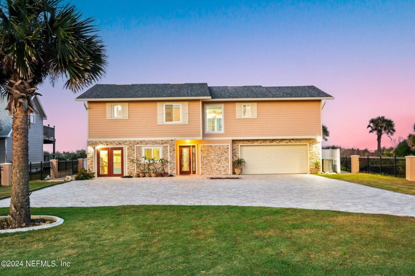 Nestled along the banks of the Atlantic Ocean sits this stunning - Beach Home for sale in Palm Coast, Florida on Beachhouse.com