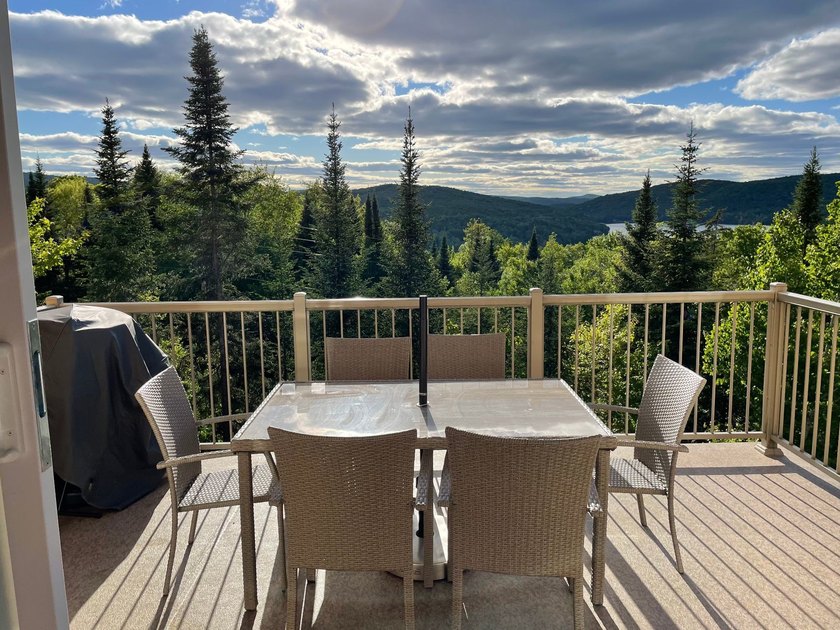 Large bright condo with 4 bedrooms and 2 full bathrooms on two - Beach Condo for sale in Mont-Tremblant, QC on Beachhouse.com