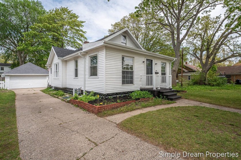 Completely updated, move-in ready home combining clean modern - Beach Home for sale in Muskegon, Michigan on Beachhouse.com