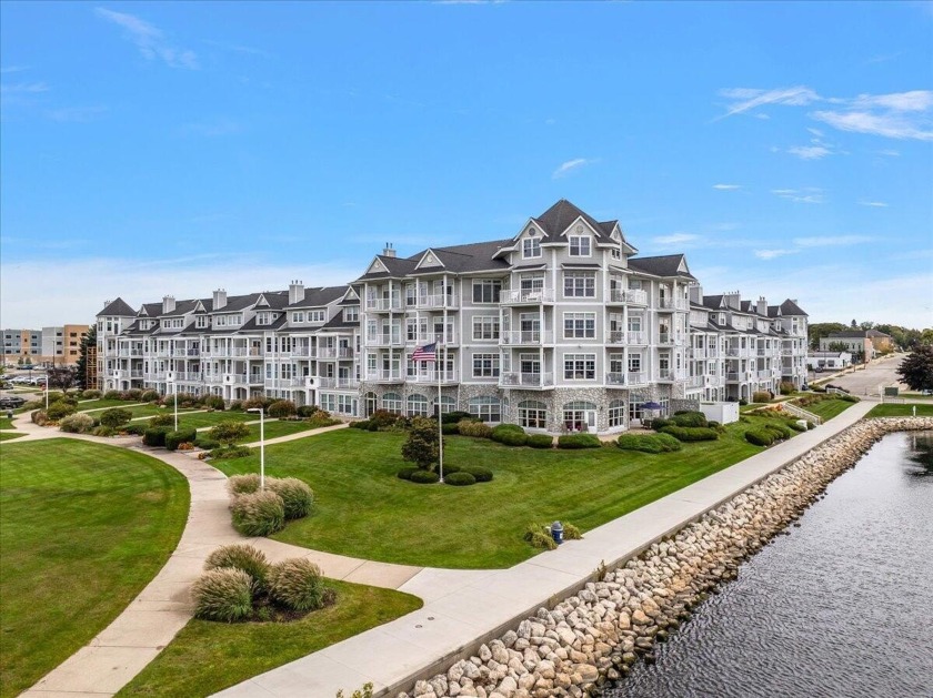Luxurious corner unit in Harbor Front Plaza! This stunning 2,424 - Beach Condo for sale in Ludington, Michigan on Beachhouse.com