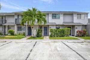 This beautifully renovated 3-bedroom, 2-bath townhome offers a - Beach Townhome/Townhouse for sale in Greenacres, Florida on Beachhouse.com