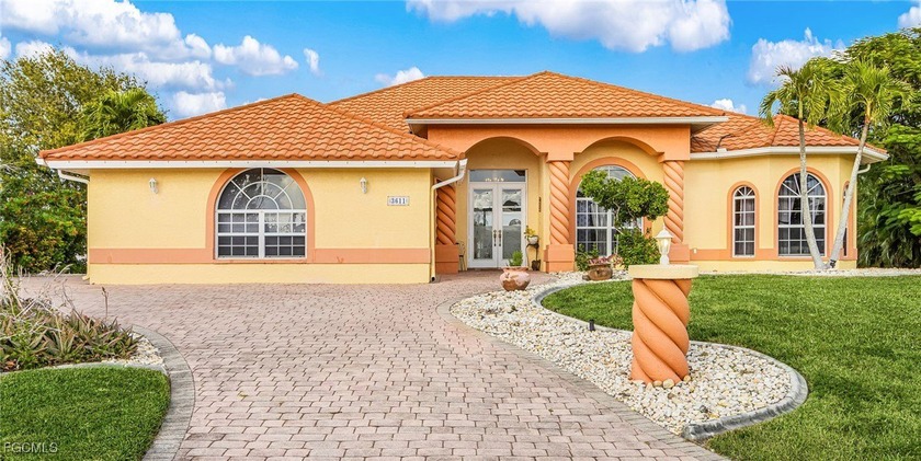 GULF ACCESS - STUNNING INTERSECTING CANAL & BASIN VIEWS! Enjoy - Beach Home for sale in Cape Coral, Florida on Beachhouse.com