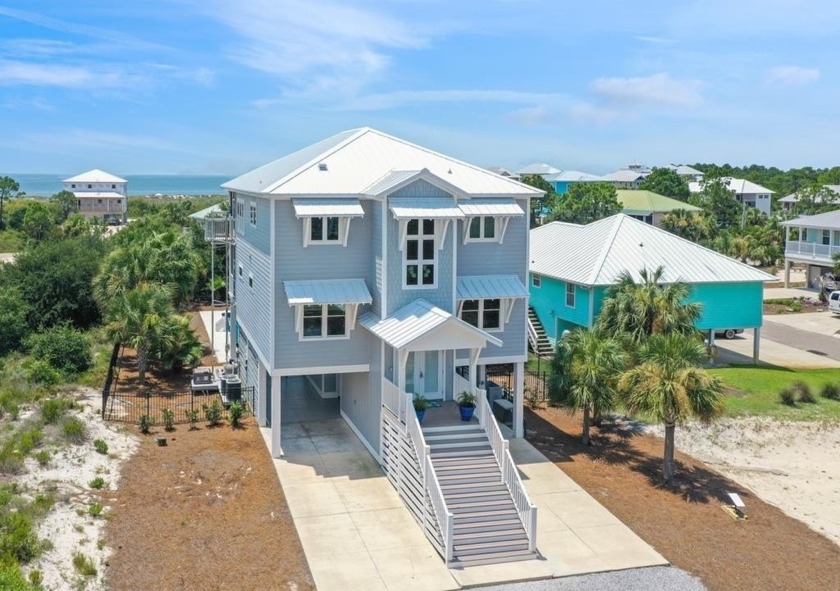 Discover your dream beach escape in this exquisite turn-key - Beach Home for sale in Cape San Blas, Florida on Beachhouse.com