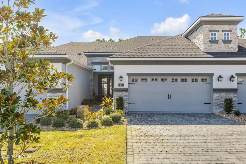 Experience modern Florida living in this stunning two-story home - Beach Townhome/Townhouse for sale in Ormond Beach, Florida on Beachhouse.com