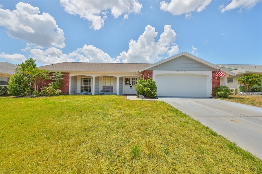 You'll adore this move-in-ready retreat, perfectly located in - Beach Home for sale in Hudson, Florida on Beachhouse.com