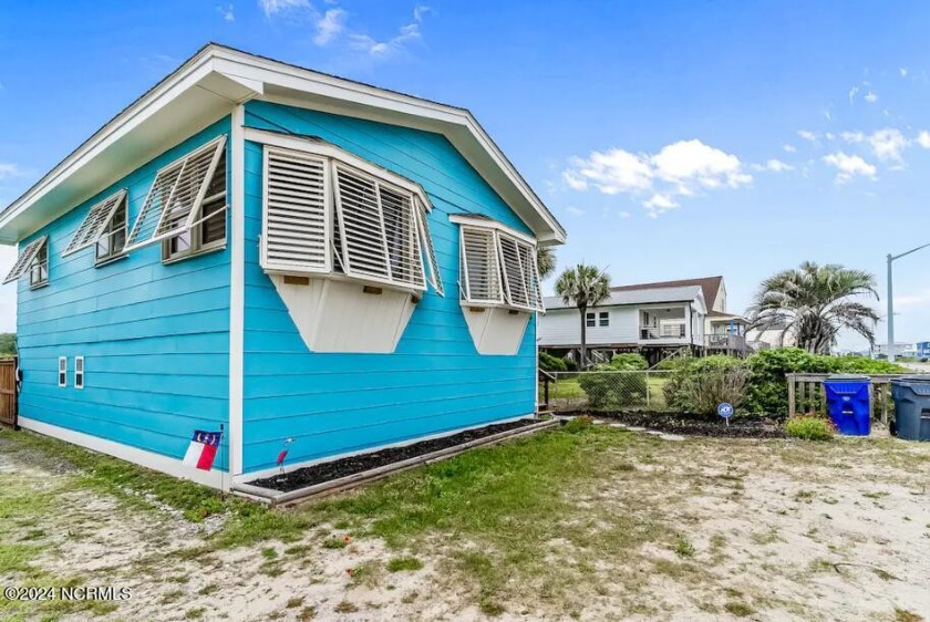 Discover beach living at its finest with this sun-soaked - Beach Home for sale in Oak Island, North Carolina on Beachhouse.com