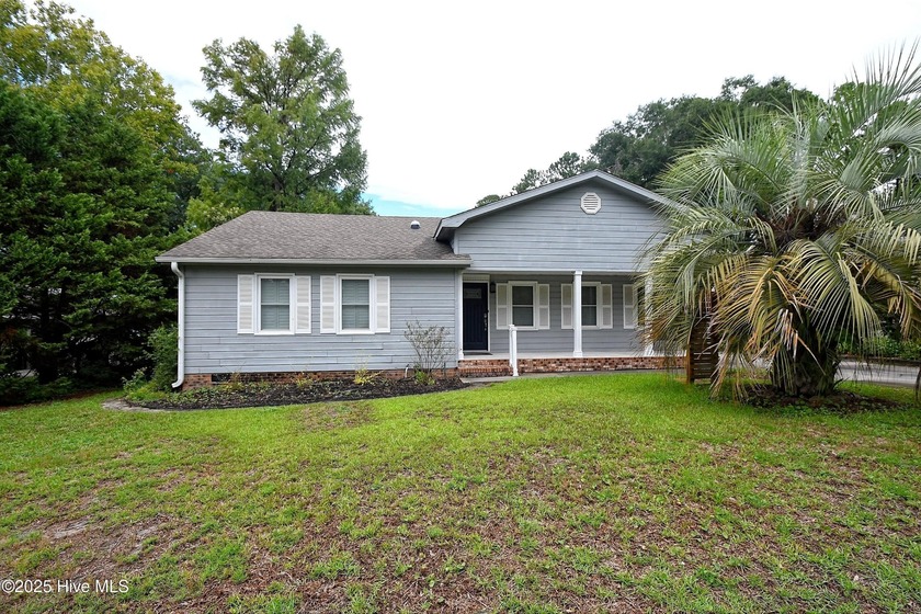Some homes are unassuming from the outside and absolutely - Beach Home for sale in Sunset Beach, North Carolina on Beachhouse.com