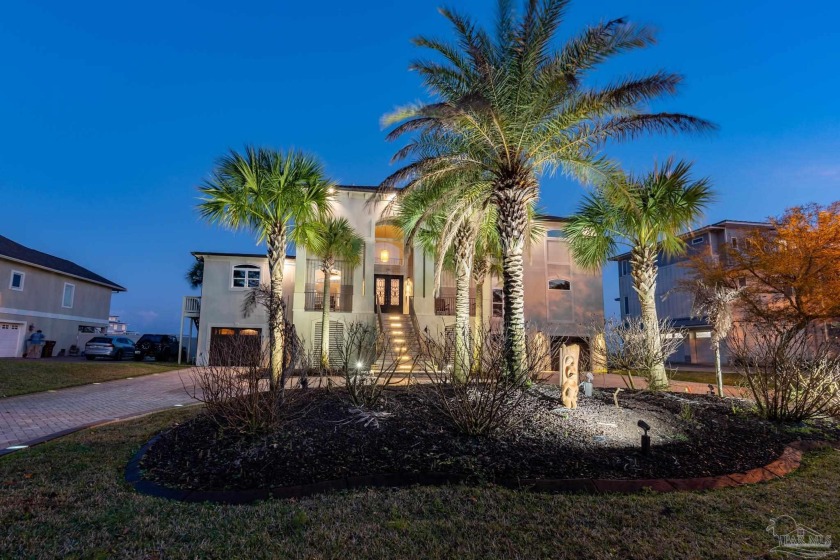 Welcome to this breathtaking custom waterfront estate, situated - Beach Home for sale in Gulf Breeze, Florida on Beachhouse.com