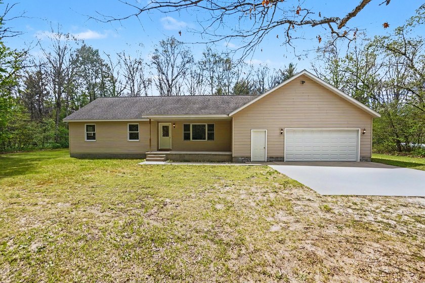 Impeccably maintained 3 Bedroom 2 Bath ranch home, located on 2 - Beach Home for sale in Montague, Michigan on Beachhouse.com