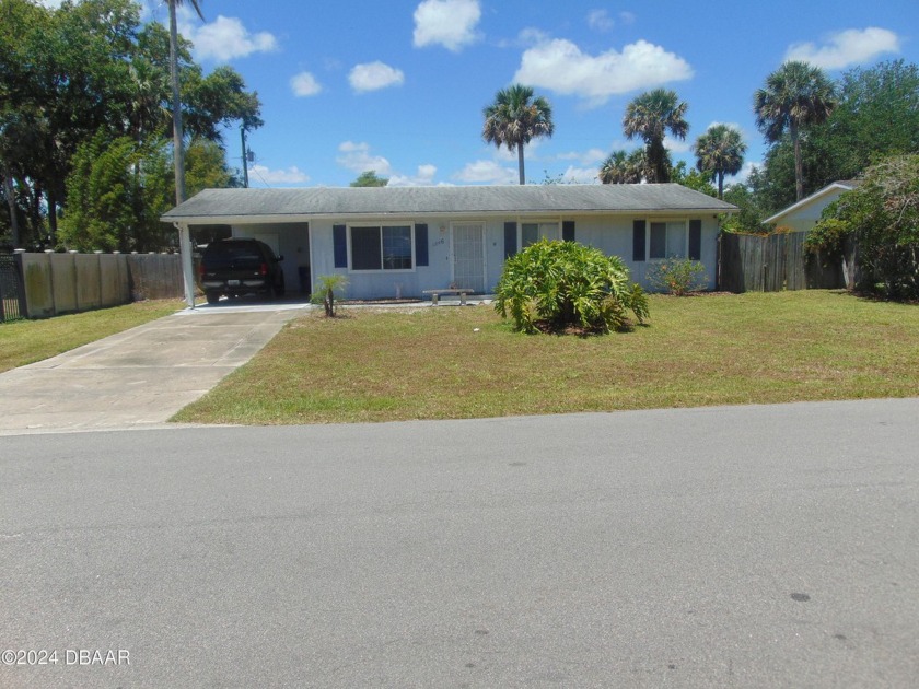 70's ranch style frame home with carport close to restaurants - Beach Home for sale in Edgewater, Florida on Beachhouse.com