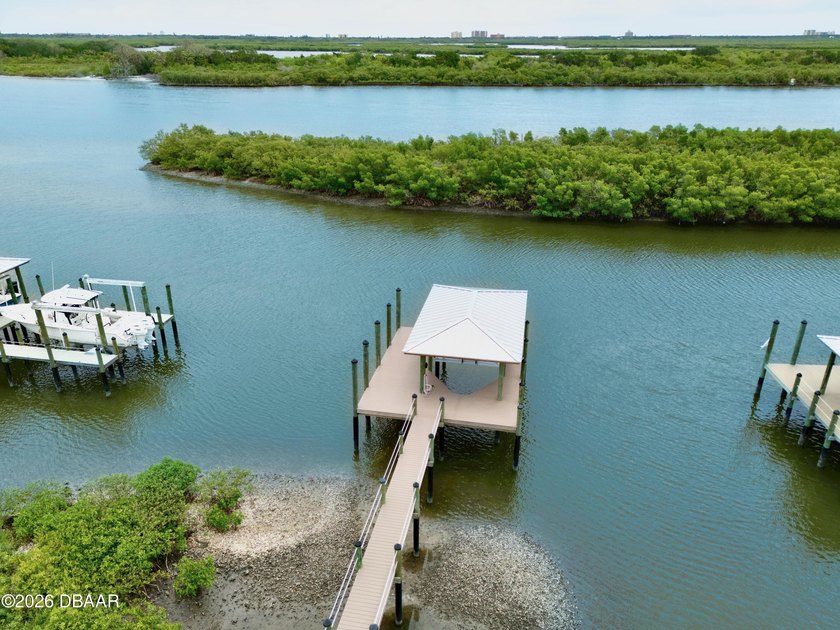 This waterfront lot offers a remarkable opportunity to build a - Beach Lot for sale in Edgewater, Florida on Beachhouse.com