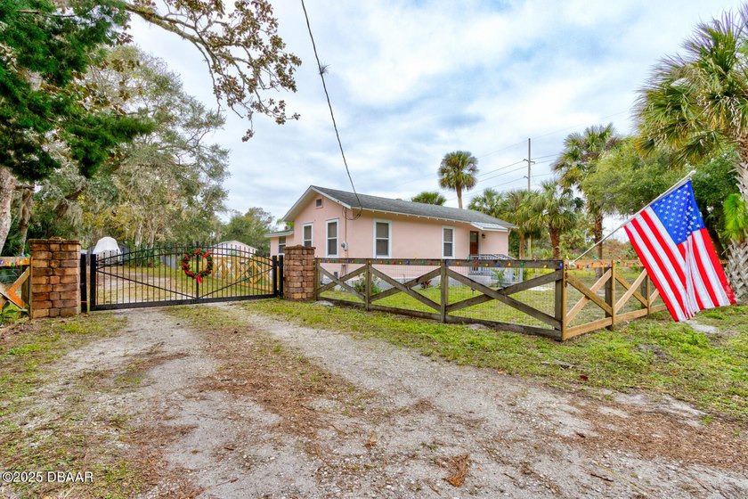 Step into a true storybook setting with this enchanting - Beach Home for sale in New Smyrna Beach, Florida on Beachhouse.com