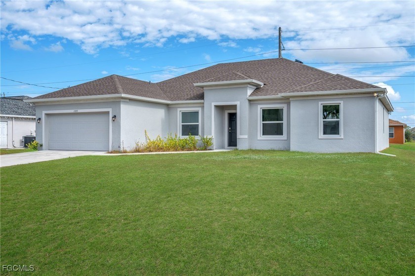 Experience modern Florida living in this beautifully designed - Beach Home for sale in Cape Coral, Florida on Beachhouse.com