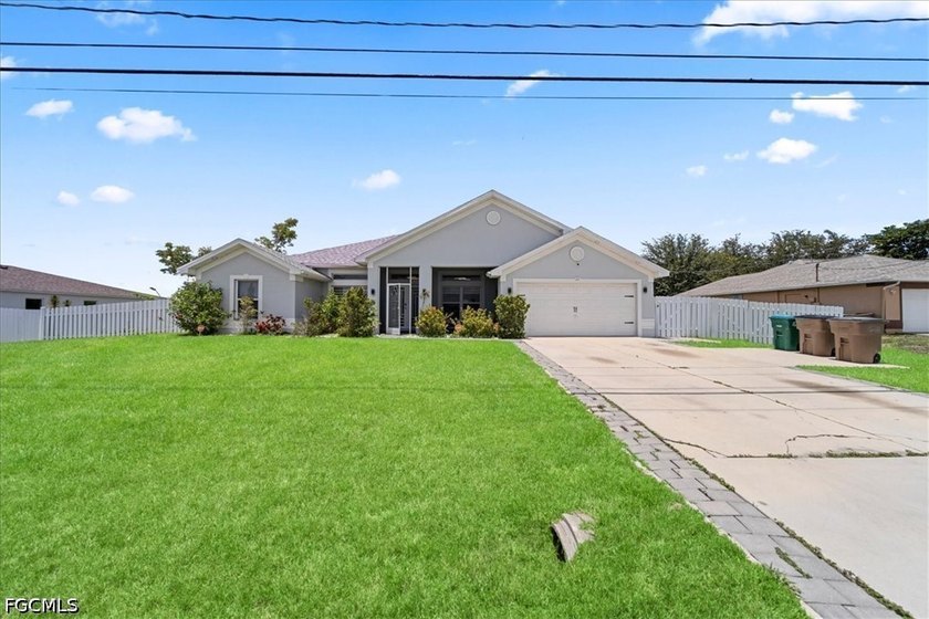 Welcome to this beautifully remodeled 4-bedroom, 2-bathroom home - Beach Home for sale in Cape Coral, Florida on Beachhouse.com