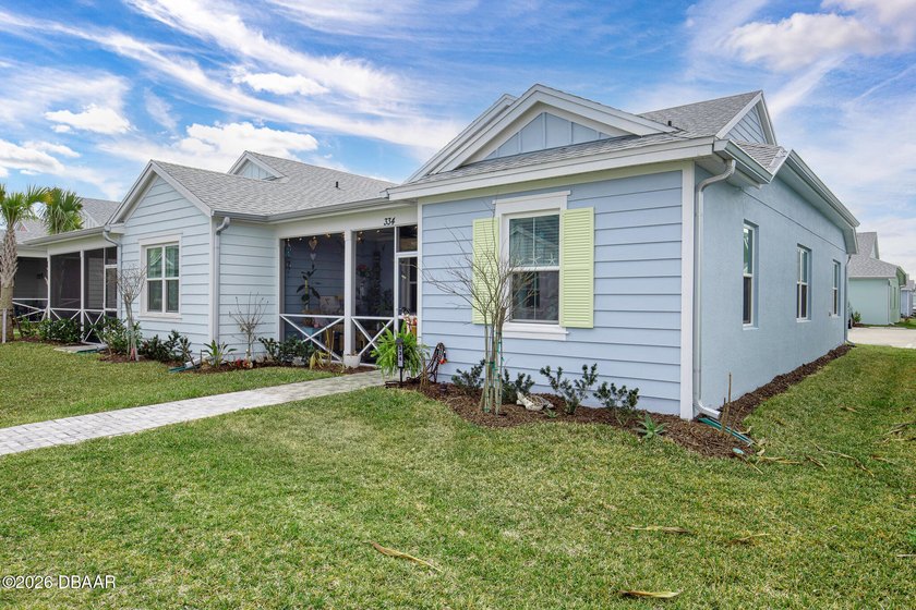 Gorgeous CAMELLIA COTTAGE with screened front porch and full - Beach Home for sale in Daytona Beach, Florida on Beachhouse.com