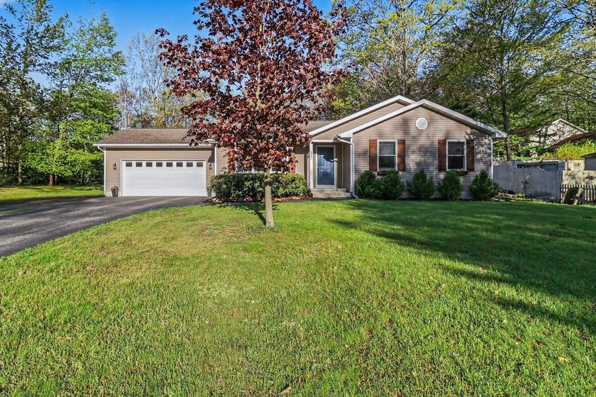 This Hamlin Township offering has all of the attributes many are - Beach Home for sale in Ludington, Michigan on Beachhouse.com