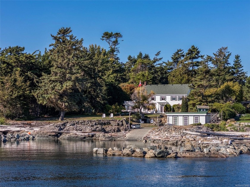 A rare offering of timeless elegance and coastal luxury, this - Beach Home for sale in Saanich, BC on Beachhouse.com