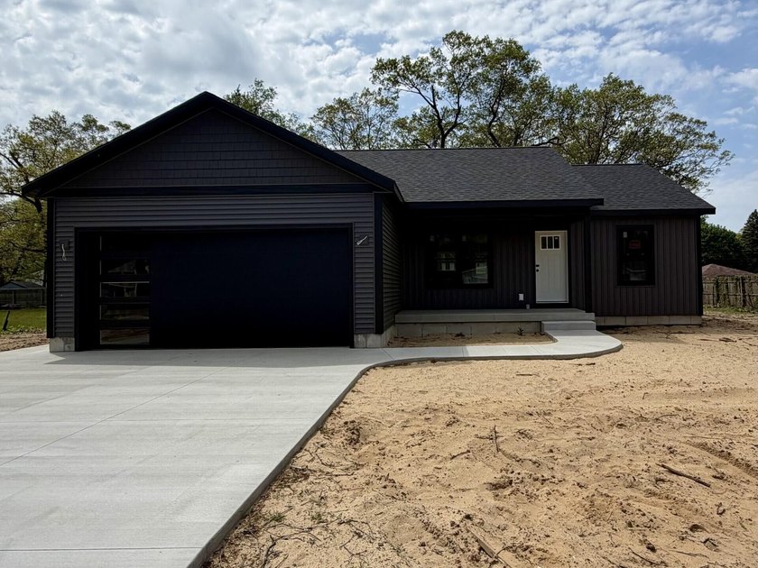 Located in the desirable Oakridge School District, this brand - Beach Home for sale in Muskegon, Michigan on Beachhouse.com