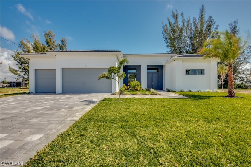 Check out this brand new custom canal home with heated pool plus - Beach Home for sale in Cape Coral, Florida on Beachhouse.com