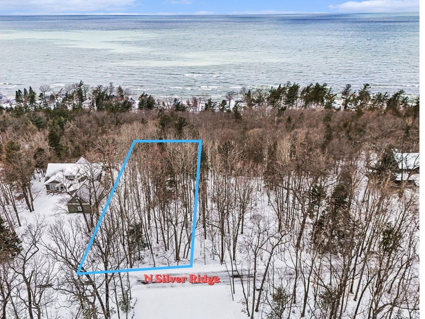 Rare Lake Michigan View Parcel. This beautifully wooded Acre+ - Beach Lot for sale in Mears, Michigan on Beachhouse.com