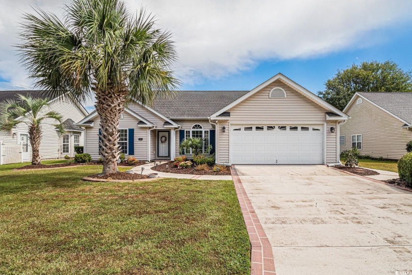 Welcome to this charming home on the pond, offering peaceful - Beach Home for sale in Murrells Inlet, South Carolina on Beachhouse.com