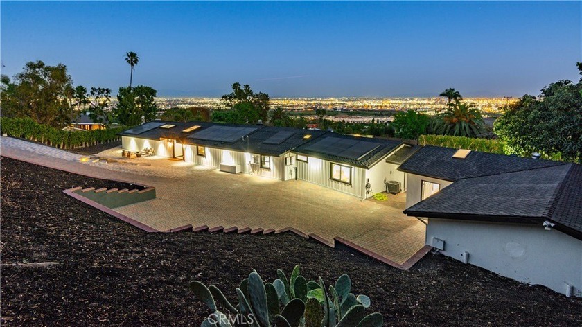 Private and gated, this reimagined single-story home sits on - Beach Home for sale in Rancho Palos Verdes, California on Beachhouse.com