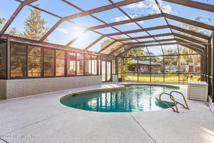 Welcome home to this beautifully updated brick pool home - Beach Home for sale in Fleming Island, Florida on Beachhouse.com