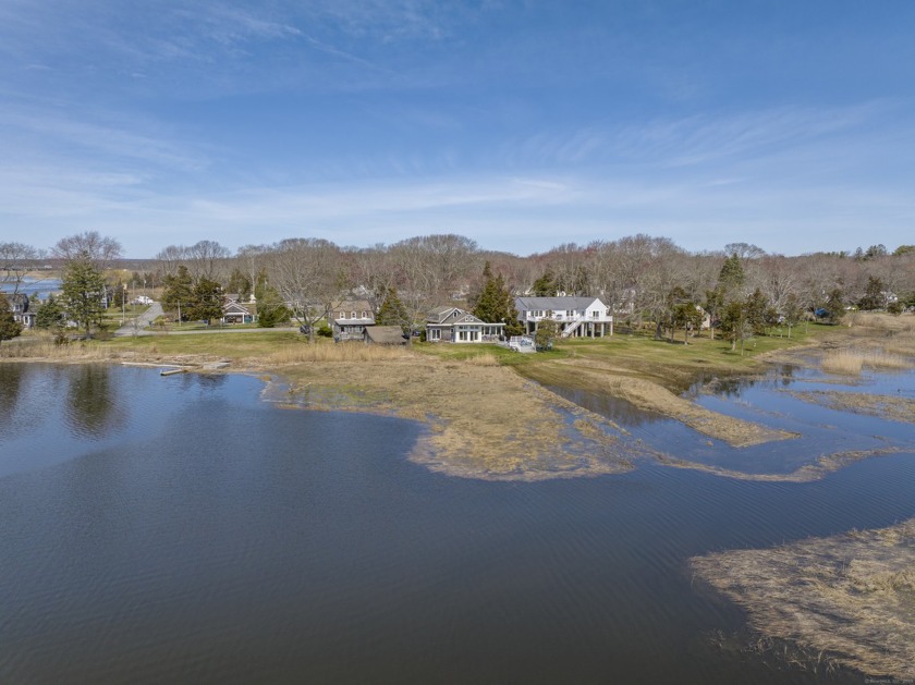 Marvel at this exquisite waterfront sanctuary nestled in Old - Beach Home for sale in Old Lyme, Connecticut on Beachhouse.com