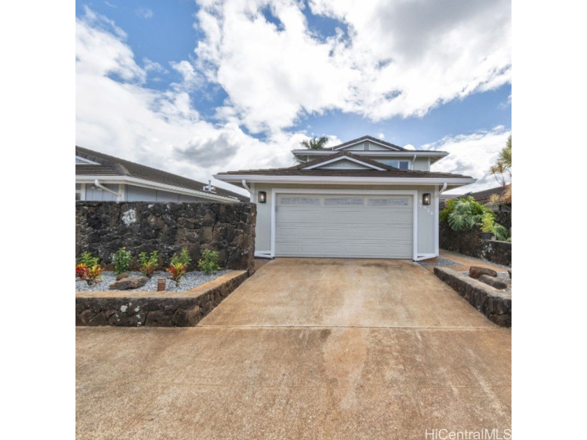 This renovated 3-bedroom, 2.5-bath home offers modern upgrades - Beach Home for sale in Waipahu, Hawaii on Beachhouse.com