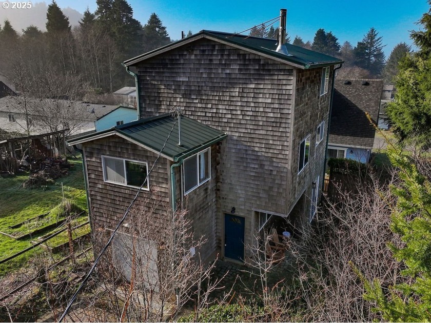 Located in a quiet neighborhood, this charming home feels like - Beach Home for sale in Rockaway Beach, Oregon on Beachhouse.com