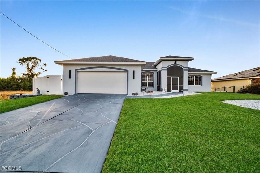 Beautiful 3-Bedroom Pool Home with Upgrades Throughout! This - Beach Home for sale in Cape Coral, Florida on Beachhouse.com