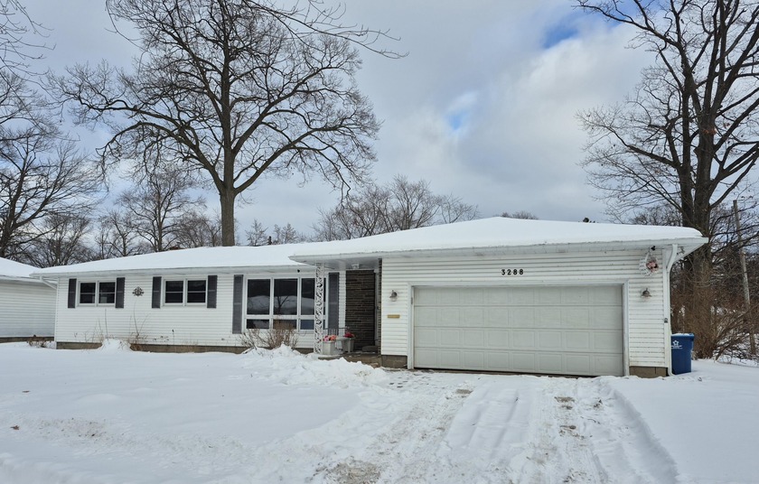 This four bedroom ranch is located on a quiet street in - Beach Home for sale in Muskegon, Michigan on Beachhouse.com