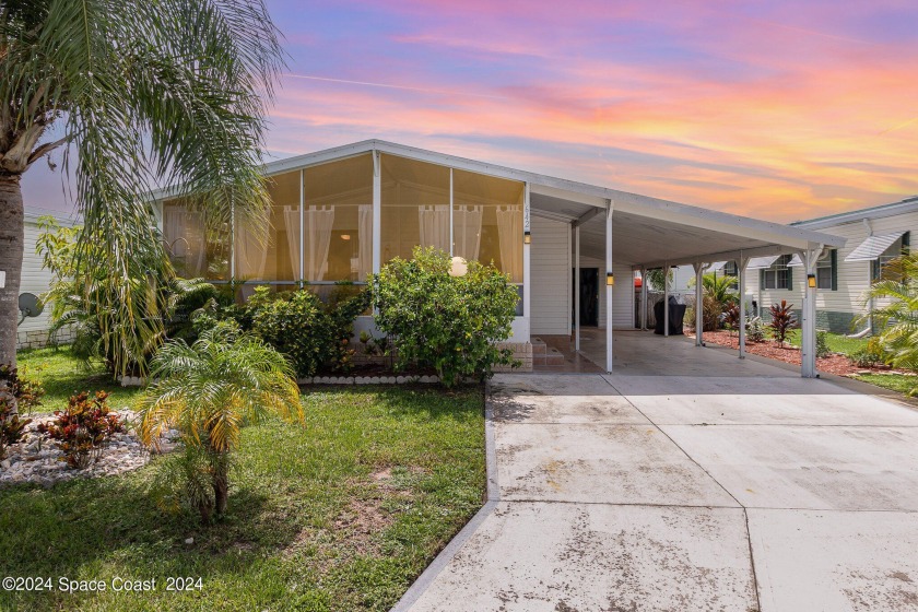 SELLERS ARE MOTIVATED!! Charming and tastefully renovated to a - Beach Home for sale in Barefoot Bay, Florida on Beachhouse.com