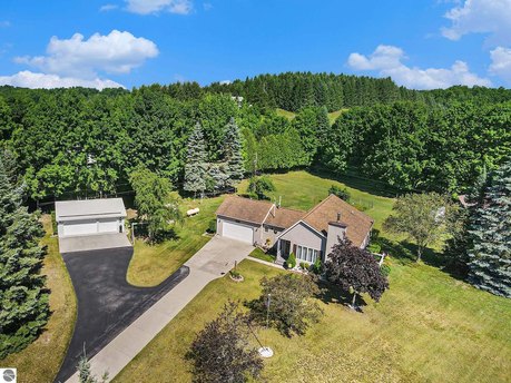 A must see, well taken care of home with outbuildings (2) for - Beach Home for sale in Cedar, Michigan on Beachhouse.com