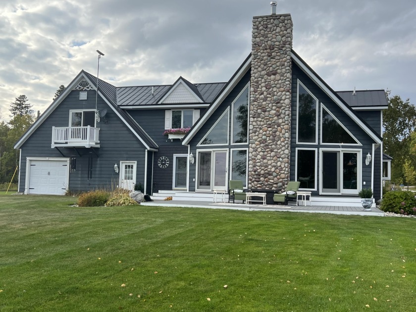 An impeccable 4,200 sq ft two story home with frontage on - Beach Home for sale in Mcmillan, Michigan on Beachhouse.com