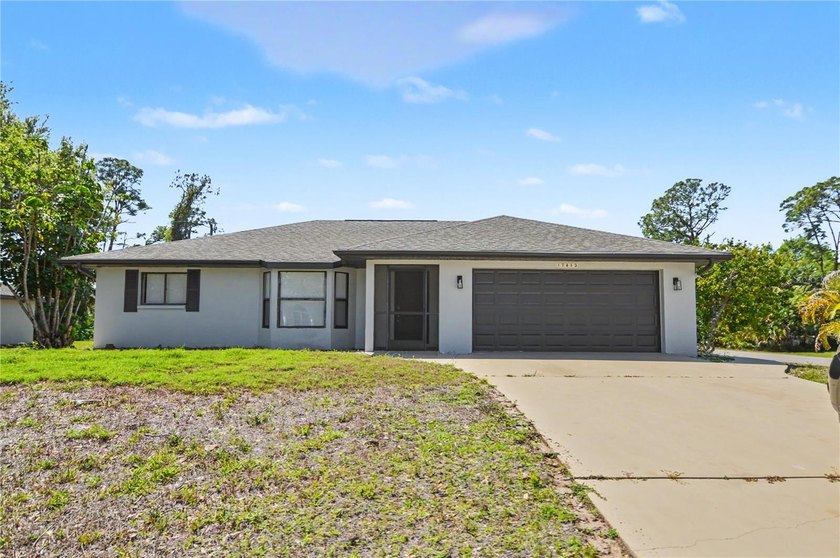 Don't miss this opportunity to own a pool home on a desirable - Beach Home for sale in Port Charlotte, Florida on Beachhouse.com