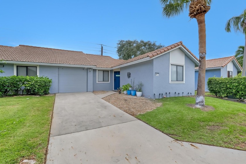 Welcome to this beautifully maintained 3-bedroom, 2-bath villa - Beach Home for sale in Boynton Beach, Florida on Beachhouse.com