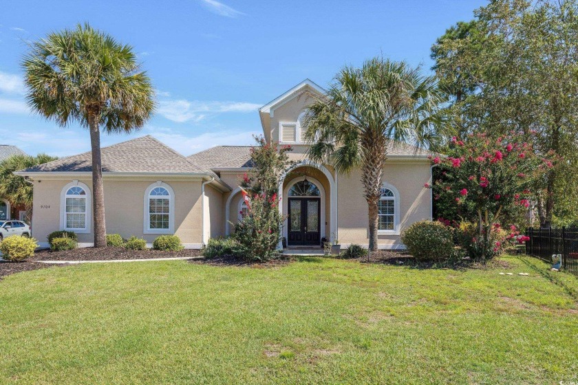 Welcome to your lakeside haven in the prestigious Plantation - Beach Home for sale in Myrtle Beach, South Carolina on Beachhouse.com