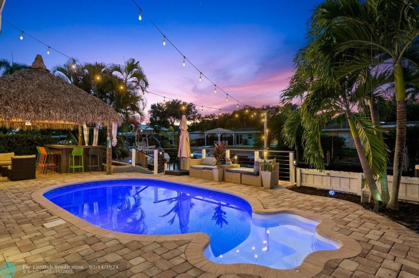 Soak up the sun by the pool, unwind in the refreshing shade of - Beach Home for sale in Fort Lauderdale, Florida on Beachhouse.com