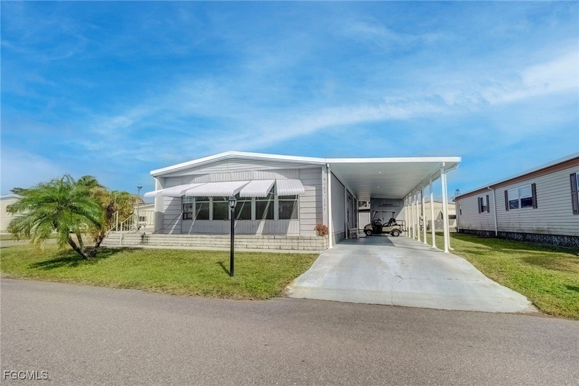 Enjoy the temperate winter weather with plenty of outdoor living - Beach Home for sale in North Fort Myers, Florida on Beachhouse.com