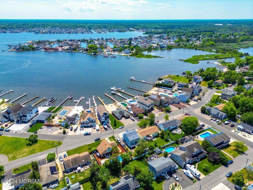 Waterfront home with a million-dollar view! This home sits on - Beach Home for sale in Toms River, New Jersey on Beachhouse.com