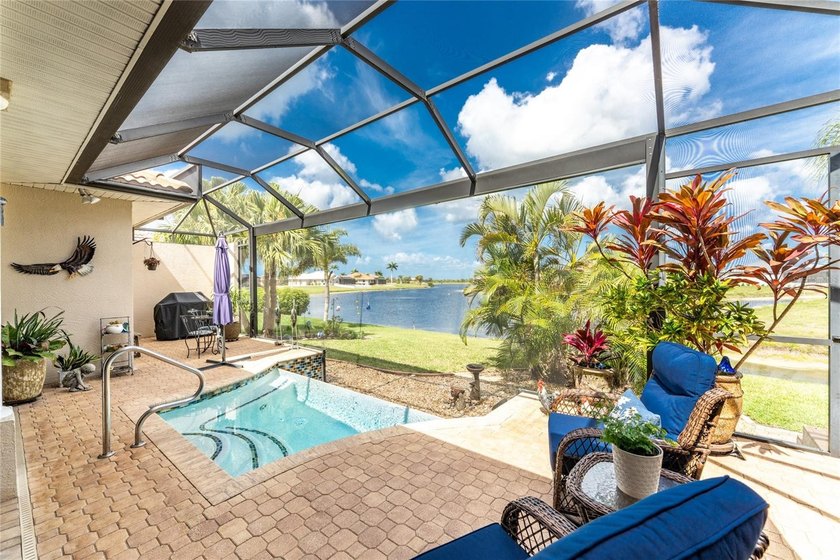 Set against dramatic panoramic lake views in Burnt Store Lakes - Beach Home for sale in Punta Gorda, Florida on Beachhouse.com