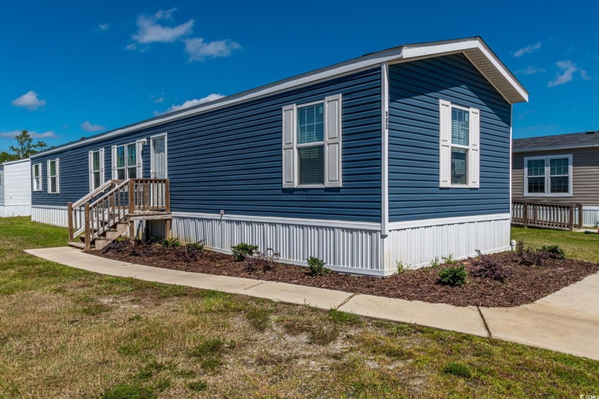 Discover the charm of this 2022 Clayton Homes Model 777 Cool - Beach Home for sale in Myrtle Beach, South Carolina on Beachhouse.com