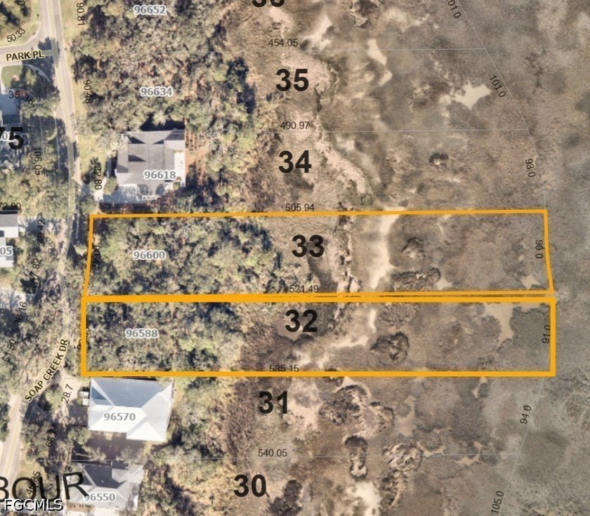 Discover a rare opportunity to own two contiguous premier marsh - Beach Acreage for sale in Fernandina Beach, Florida on Beachhouse.com